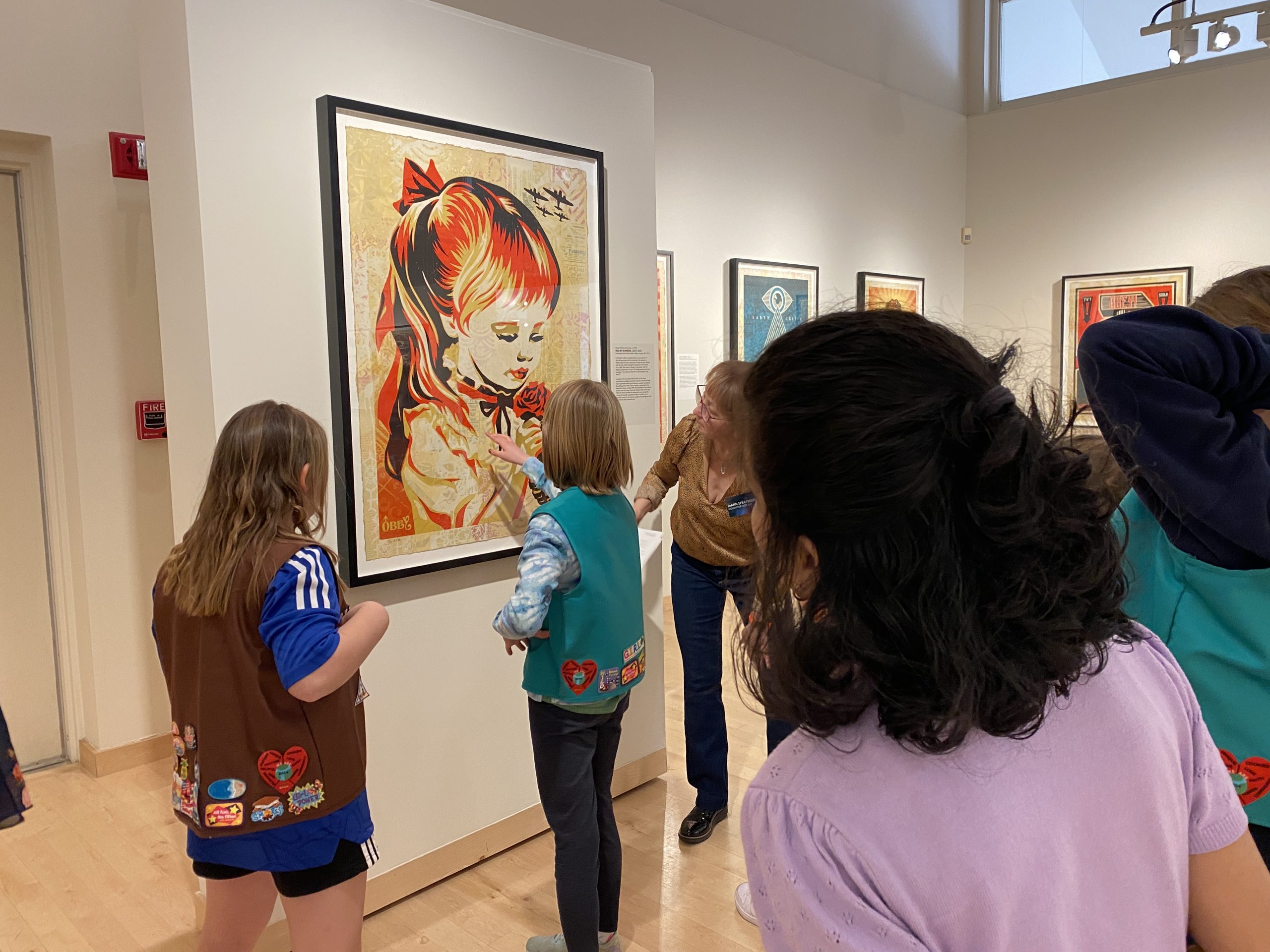 Visitors exploring art at Krasl